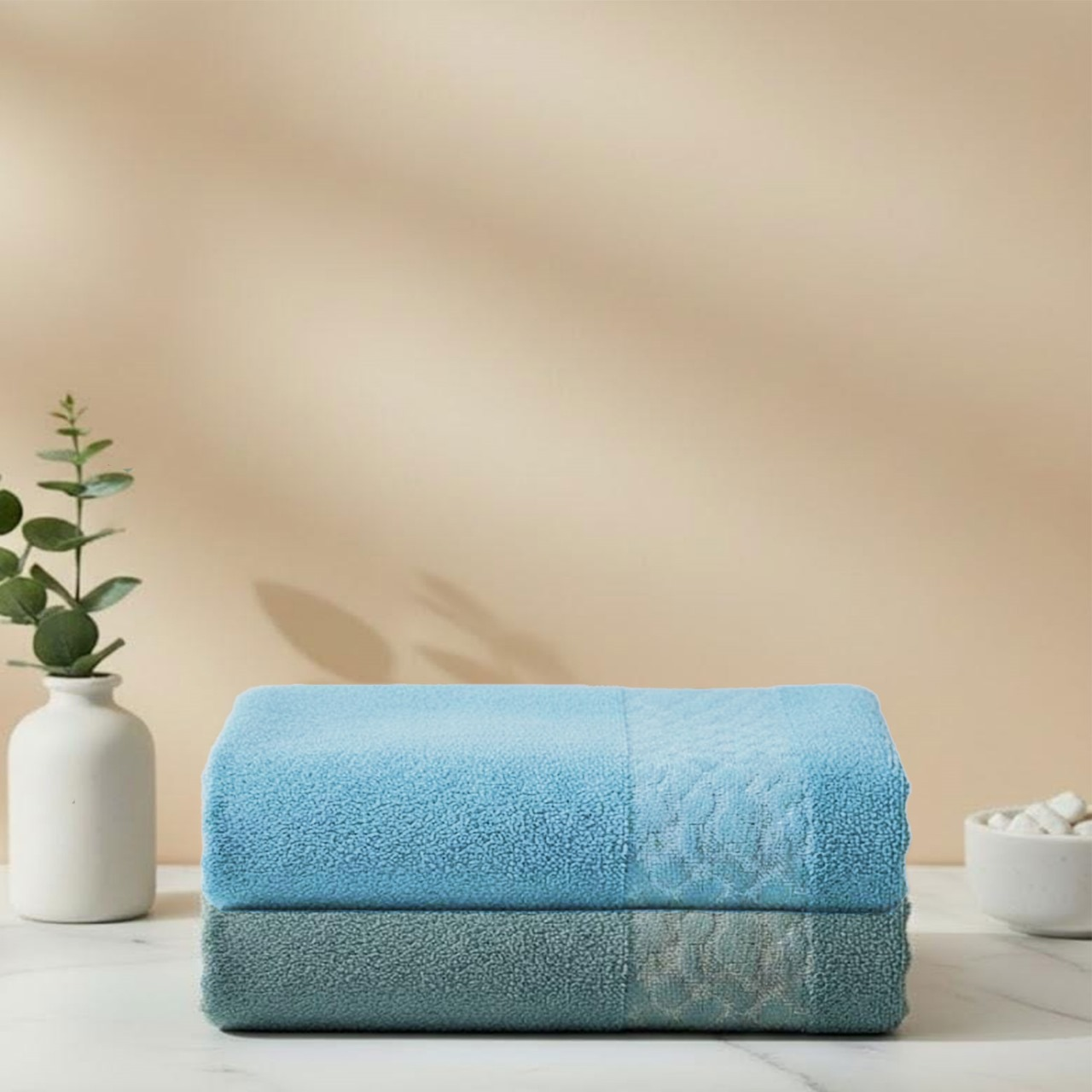 Wrap yourself in softness with this 50×100 cm cotton towel. Lightweight yet highly absorbent, it features an elegant decorative border that adds a touch of style to your bathroom. Perfect for daily use or as a chic accent piece.