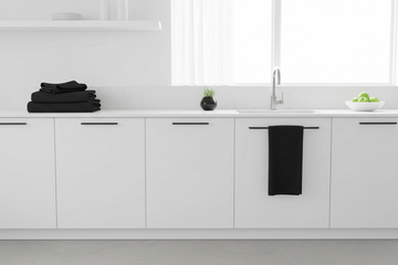 clean minimalistic black Kitchen Towels in a white design modern Kitchen minimalistic Kitchen 
